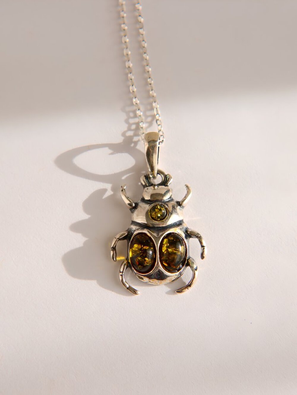 Baltic Green Amber Beetle Necklace in Sterling Silver
